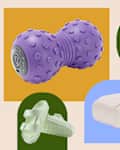 Purple textured massage ball, blue bedding set, white blanket, green sandals, and a fox-shaped plush toy.