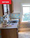 before of kitchen with brown wood cabinets and blue and brown tiling