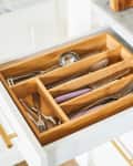 Wooden utensil organizer inside drawer