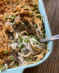 Chicken Tetrazzini (baked spaghetti with peas, chicken and mushroom in a creamy sauce) in a pan