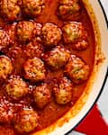 close up of meatballs in pan