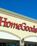 HomeGoods store exterior with red signage and arched windows.