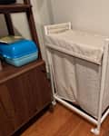 ENHET Laundry bin with casters in someone's home