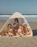 5 kids in a popup Lozi & Gabe tent on the beach