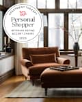 2 Interior Define Maxwell accent chairs in living room with seal in upper left that reads "apartment Therapy Personal Shopper: Interior Define Accent Chairs"