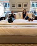 Emma and Sarah on Loxley Bed at the Room & Board NYC store. Personal Shopper seal in upper left