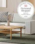 Living room with Article sofa and coffee table and personal shopper seal in upper right