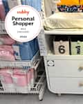 MYLLRA Changing table with drawers in IKEA store with personal shopper seal in upper left