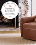 Pottery Barn accent chair in living room with personal shopper seal in upper left