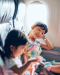 Little girl portrait with smiling on airplane