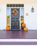 Fall Decoration Adorns Beautiful Entry Way To Home.