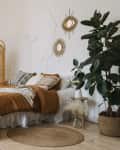 Comfort apartment in bohemian style interior with hygge bedroom