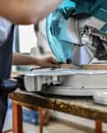Modern Circular Saw Used For Precise Cutting At Woodworker's Shop