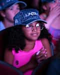 NEW YORK, NEW YORK - AUGUST 23: A view of the audience during the KPop Demon Hunters A Sing-Along Event fan surprise at Paris Theater on August 23, 2025 in New York City. (Photo by Roy Rochlin/Getty Images for Netflix)