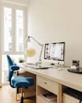 Home office with computer desk in modern building