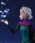 Woman with braided hair in a teal dress and purple cape conjures snowflakes in a dark, starry night.