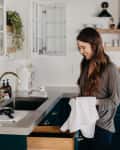 Happy Woman Cleaning.
