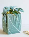 A gift wrapped furoshiki-style in a cloth