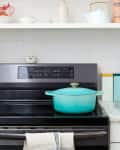 kitchen with blue pot on the stove