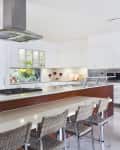 Modern kitchen with stainless steel appliances in Australian mansion