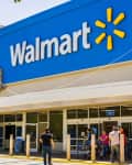 People going in and coming out of a Walmart store on a sunny day, south San Francisco bay area.