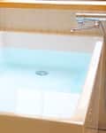 A clean bathtub with hot water