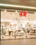 BUCHAREST, ROMANIA - JANUARY 24: H&M Store On January 24, 2014 In Bucharest, Romania. Hennes & Mauritz is a Swedish retail-clothing company and It is ranked the second largest global clothing retailer