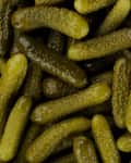Pickled gherkins cucumbers top view