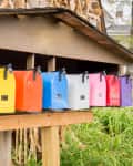 row of colorful mailboxes