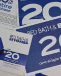 Pile of multiple Bed Bath and Beyond coupons that are now unusable due to company's bankruptcy and store closures