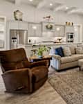 Dallas, Texas - May 27th 2023: a farmhouse-style home living room with a stone fireplace
