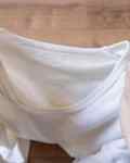 white T-shirt with a stretched out collar