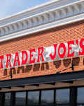 Massachusetts, USA - 19 April 2024. General view of the Trader Joe's logo sign on a supermarket building facade wall