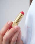 Dirty cosmetic lipstick stain on clothes. everyday life stain concept. High quality photo