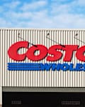 Hillsboro, OR, USA - Nov 17, 2021: Costco sign is seen at the entrance to its store in Hillsboro, Oregon. Costco Wholesale Corporation is an American multinational retail corporation.