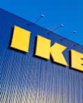 IKEA Store sign and logo hanging on the store building with a natural complement. The world's largest retailer of interior and exterior products needed.