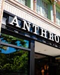 Napa, CA US - July 5, 2025: Anthropologie logo sign on its store brick facade in Old Mill District, Bend. Anthropologie is an American retailer that sells clothing, jewelry, home furniture, decor