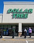 Lakeland, Florida USA - 01 05 26: Dollar tree retail store and people clear blue sky