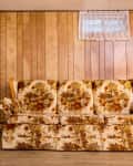 old couch from the 70s, in a basement
