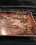 Baking sheet before removing burnt spots.