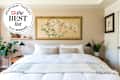 Bedroom with seal in upper left that reads: Apartment Therapy The Best List 2024 Bedding