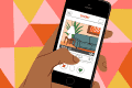 Hand holding a smartphone displaying a dating app profile with a living room illustration featuring a sofa and lamp.