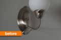 Wall-mounted sconce with a brushed nickel finish and frosted glass shade, labeled "before" in orange.