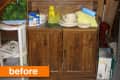 Wooden cabinet with glassware, dishes,