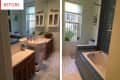 Bathroom with pedestal sink, wooden cabinets, blue tile accents, and a bathtub under a window with plants.