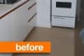 Small kitchen with white cabinets, electric stove, and countertop appliances, labeled "before."