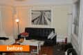 Living room with black sofa, white coffee table, floor lamp, wall art, and a dog on a brown bed.