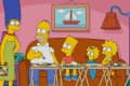 Family sitting on a couch with TV trays, eating dinner, while a woman stands holding a cereal box.