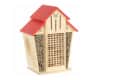 Wooden insect house with red roof, bamboo tubes, and butterfly engravings.