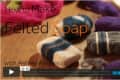 Felted soap bars in various colors on a wooden surface, with text overlay about making felted soap.